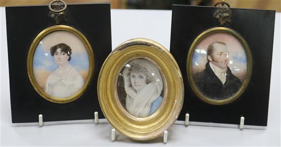 A group of three oval miniature portraits,